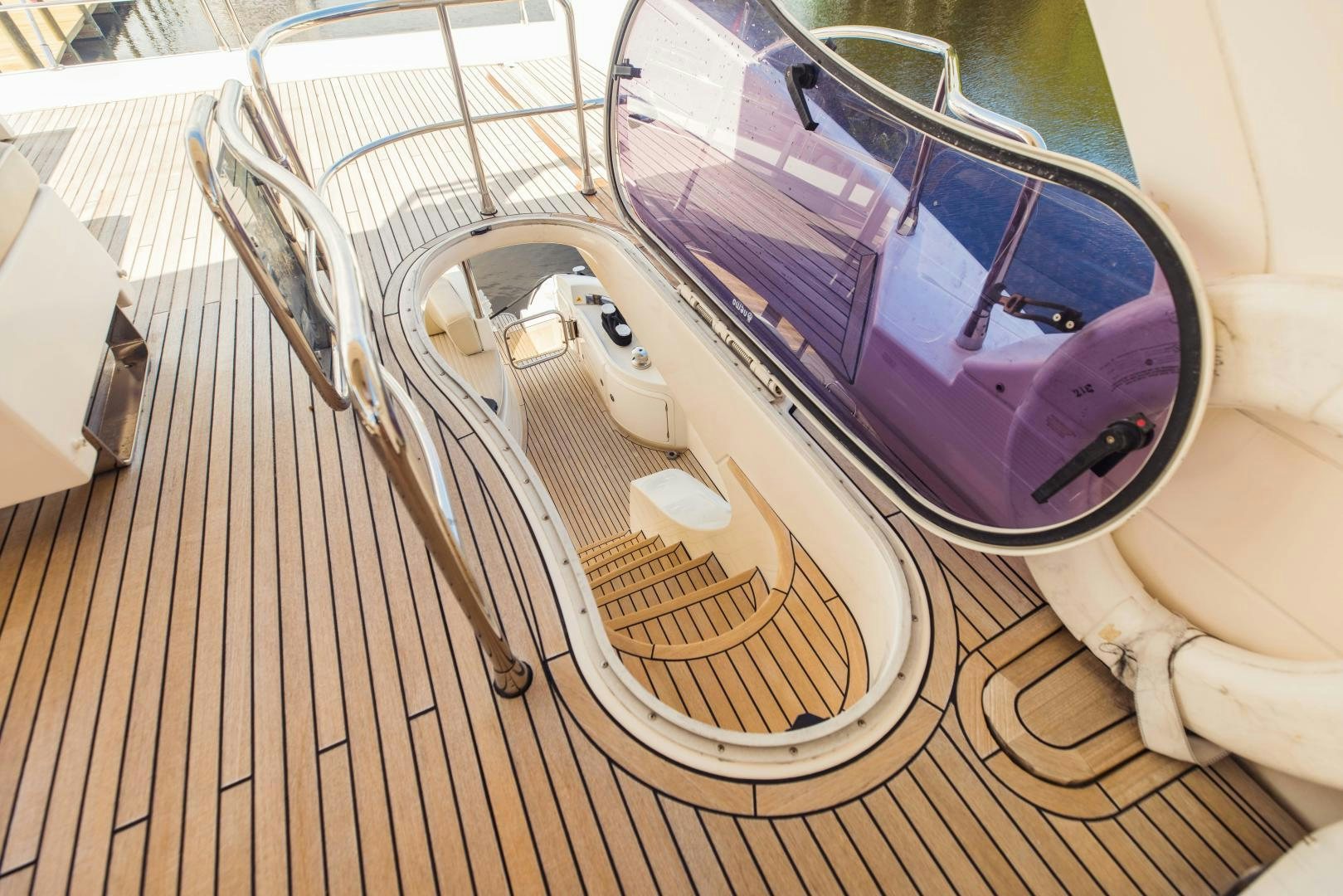 a car with a steering wheel aboard Azimut 70 Yacht for Sale