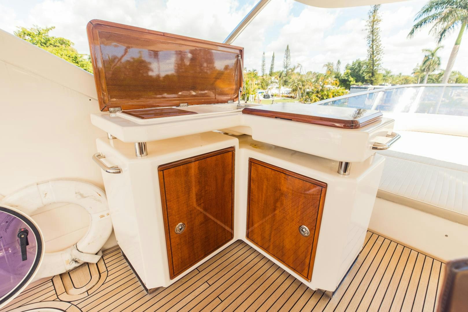 a bathroom with a toilet and a sink aboard Azimut 70 Yacht for Sale