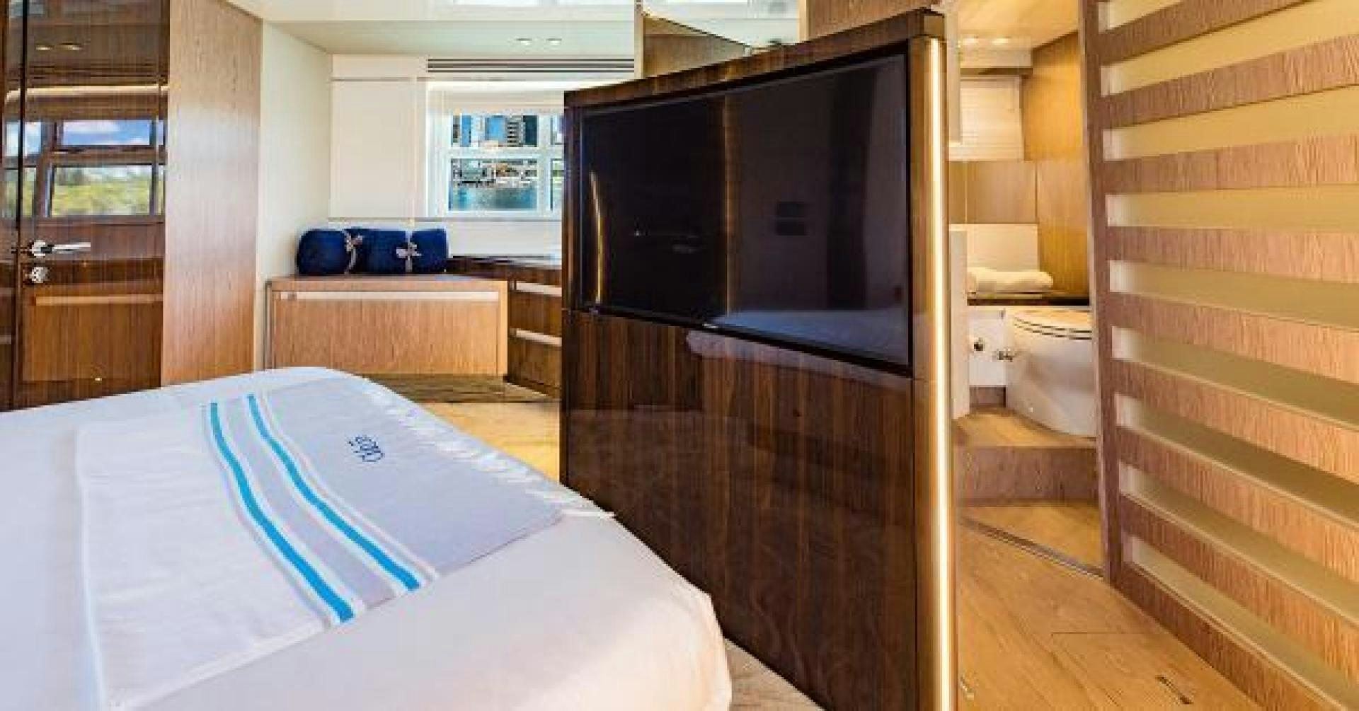 a bedroom with a bed and a closet aboard SEA BAR Yacht for Sale