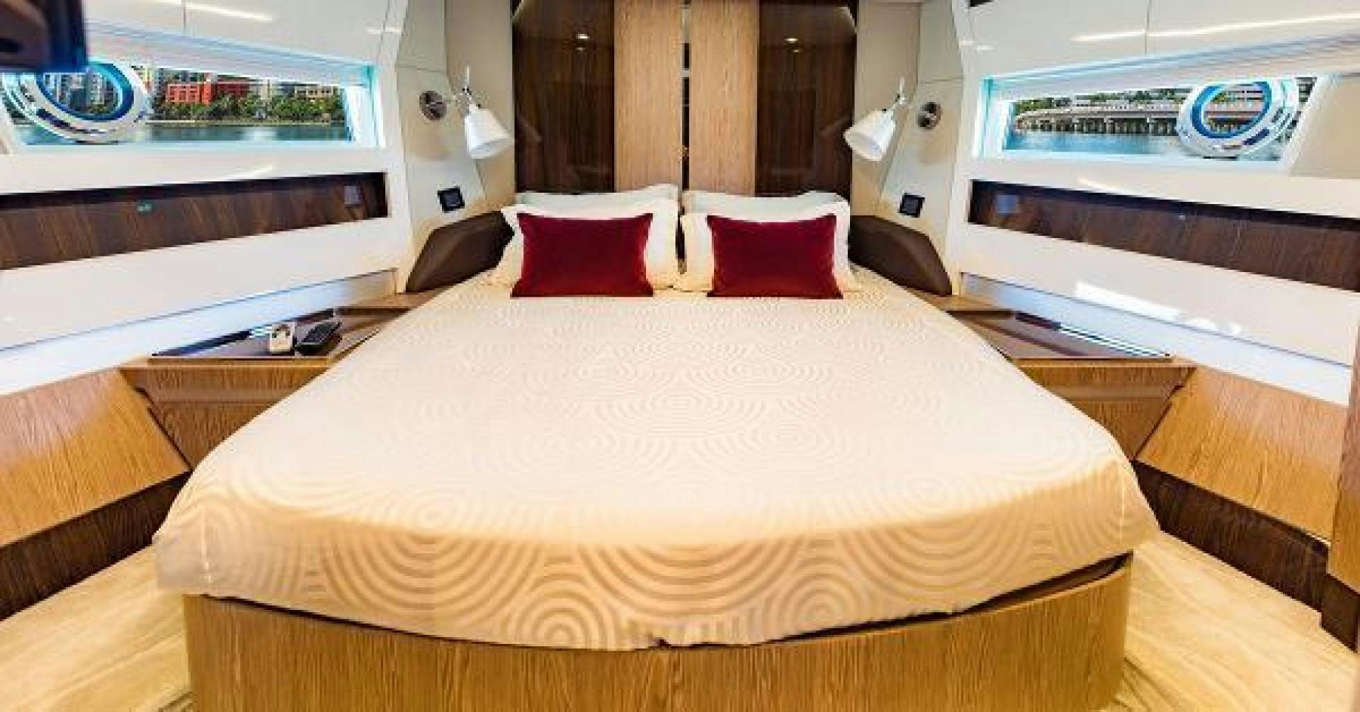 a bed with pillows on it aboard SEA BAR Yacht for Sale