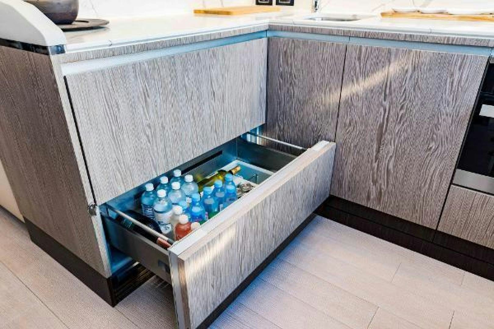 a kitchen with a blue object in it aboard SEA BAR Yacht for Sale