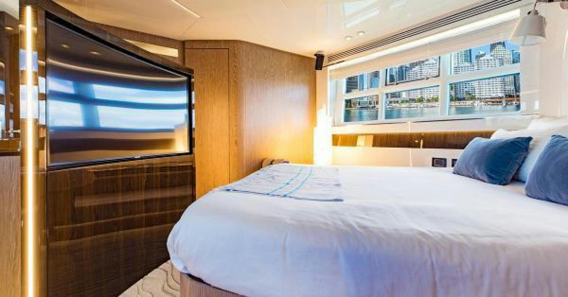 a bedroom with a large bed aboard SEA BAR Yacht for Sale