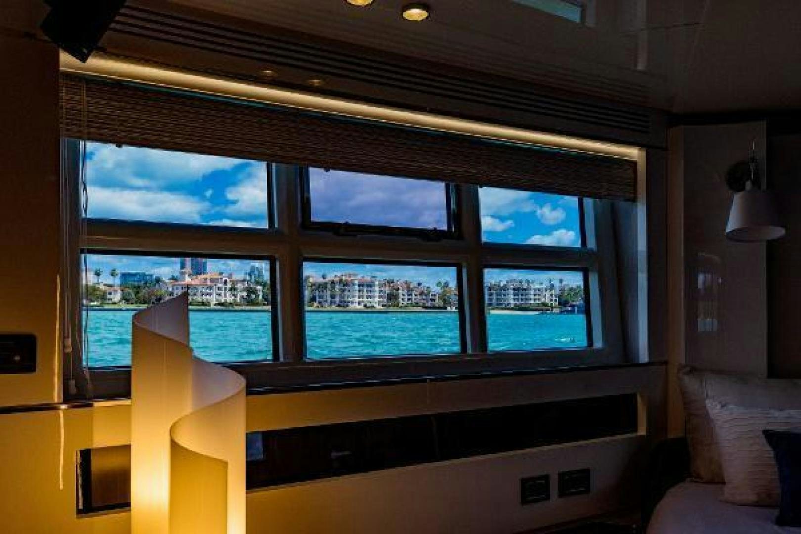 a room with a window and a couch aboard SEA BAR Yacht for Sale