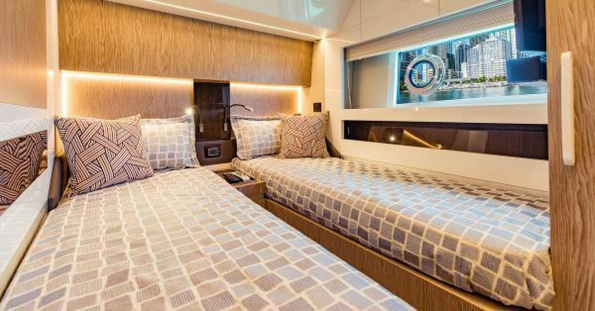 a room with two beds aboard SEA BAR Yacht for Sale