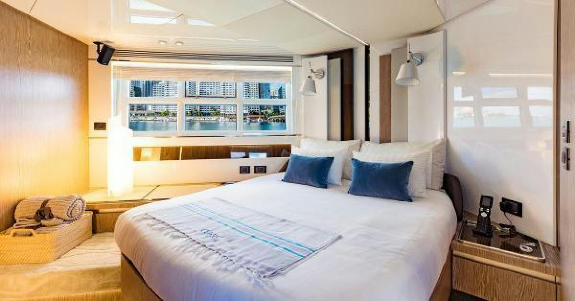 a bedroom with a large bed aboard SEA BAR Yacht for Sale