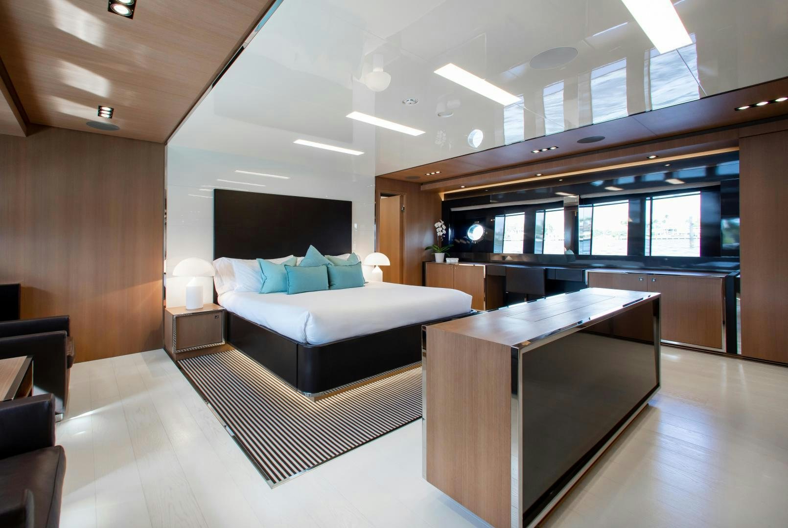 a large living room with a large window aboard CHOP CHOP Yacht for Sale