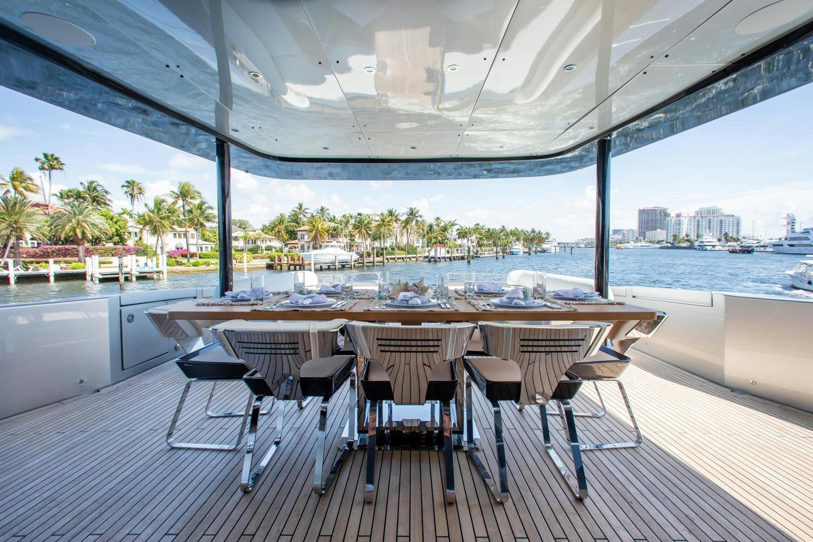 a table and chairs on a deck aboard CHOP CHOP Yacht for Sale
