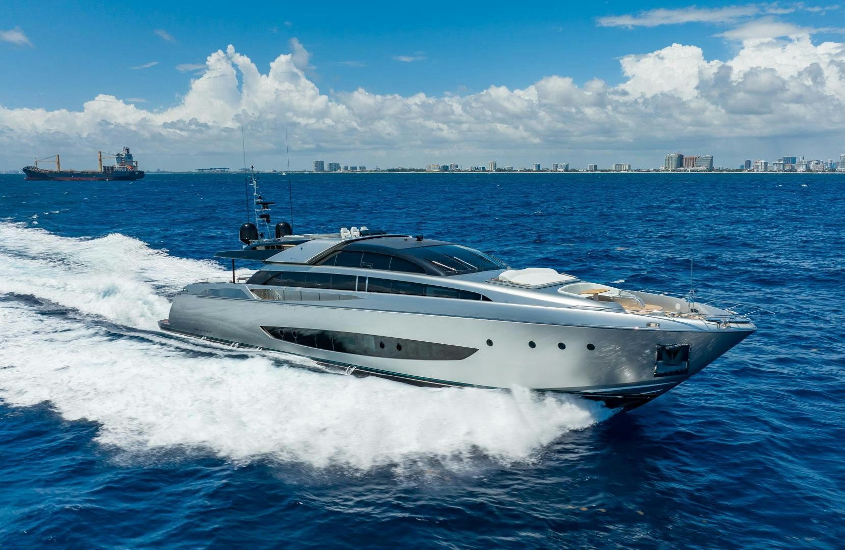 a white yacht on the water aboard CHOP CHOP Yacht for Sale