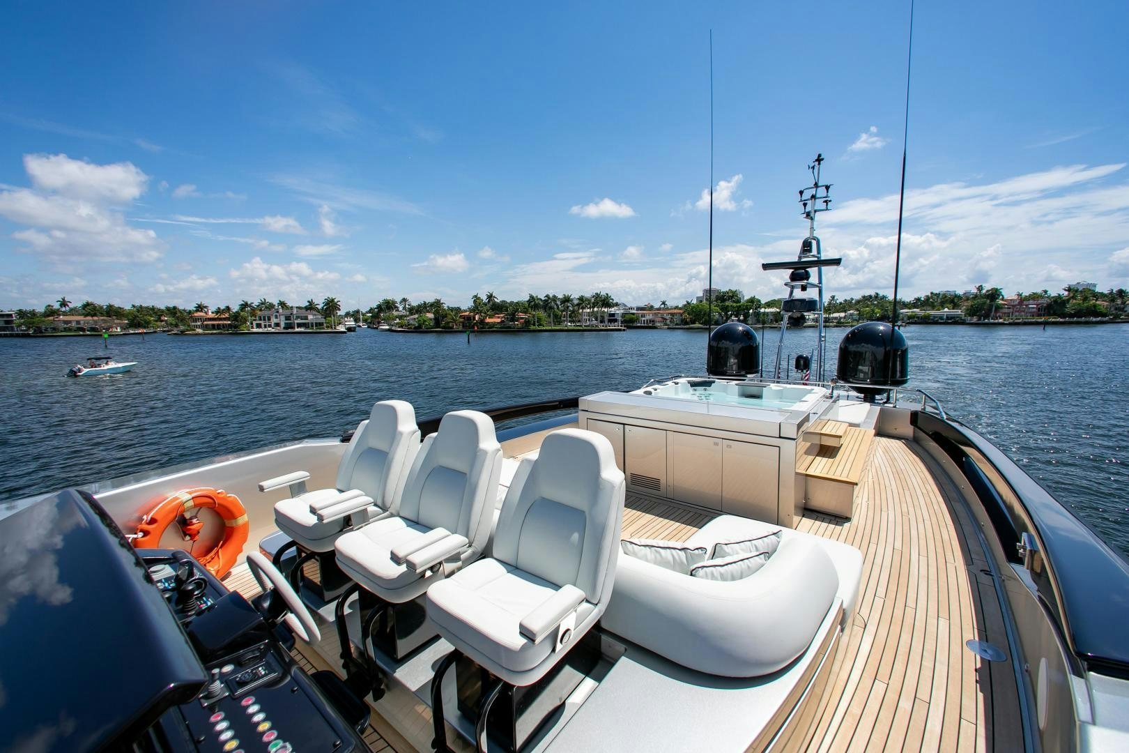 a boat with white chairs on it aboard CHOP CHOP Yacht for Sale