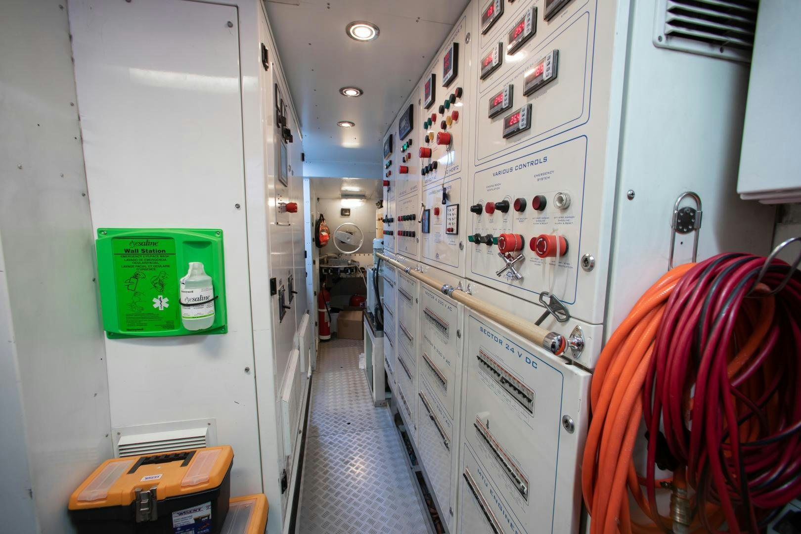 a hallway with several machines aboard CHOP CHOP Yacht for Sale