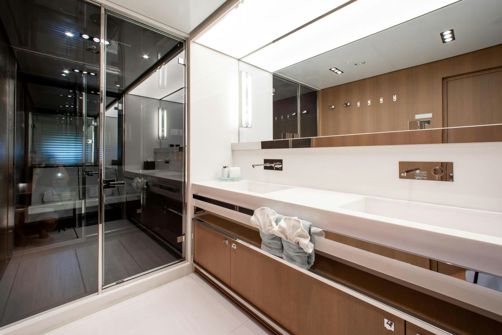 a large bathroom with a large mirror aboard CHOP CHOP Yacht for Sale