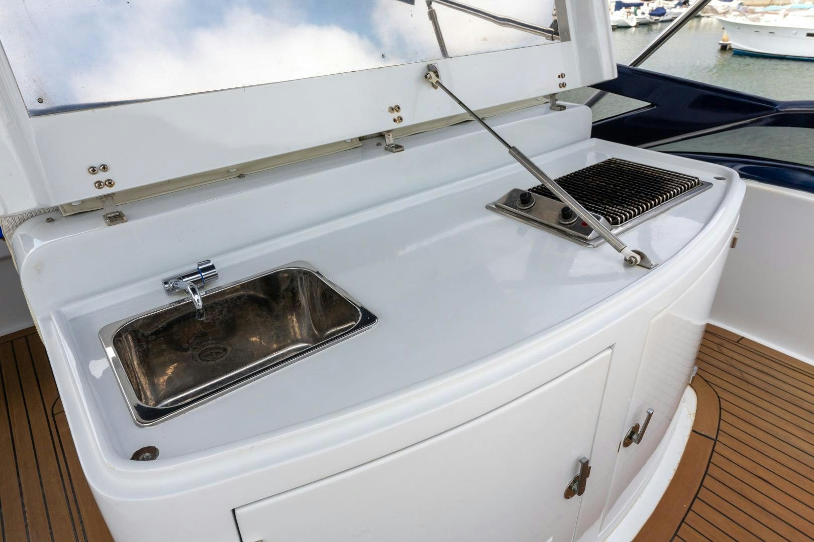 the front of a white car aboard GRAVITY Yacht for Sale