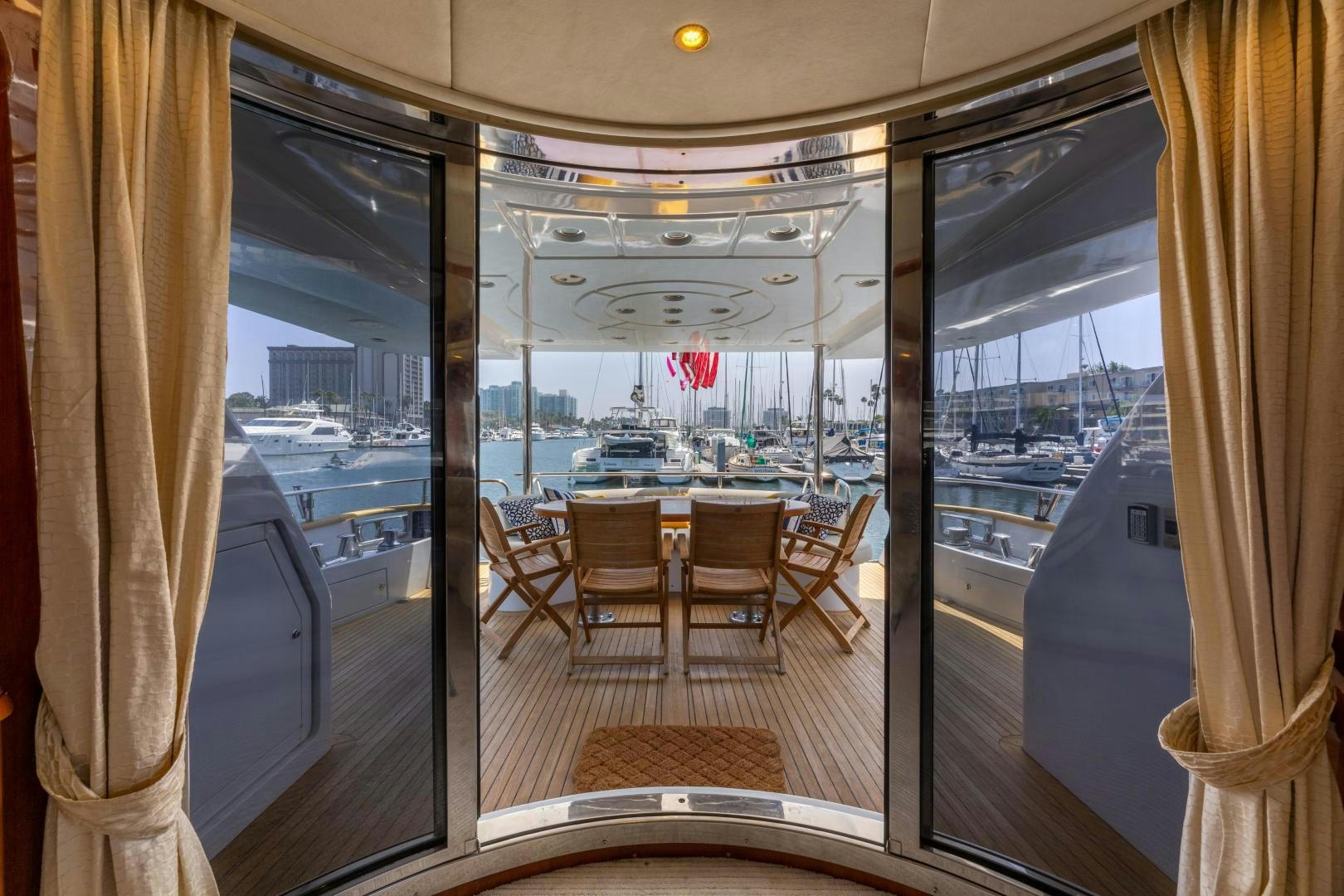 a room with a table and chairs aboard GRAVITY Yacht for Sale