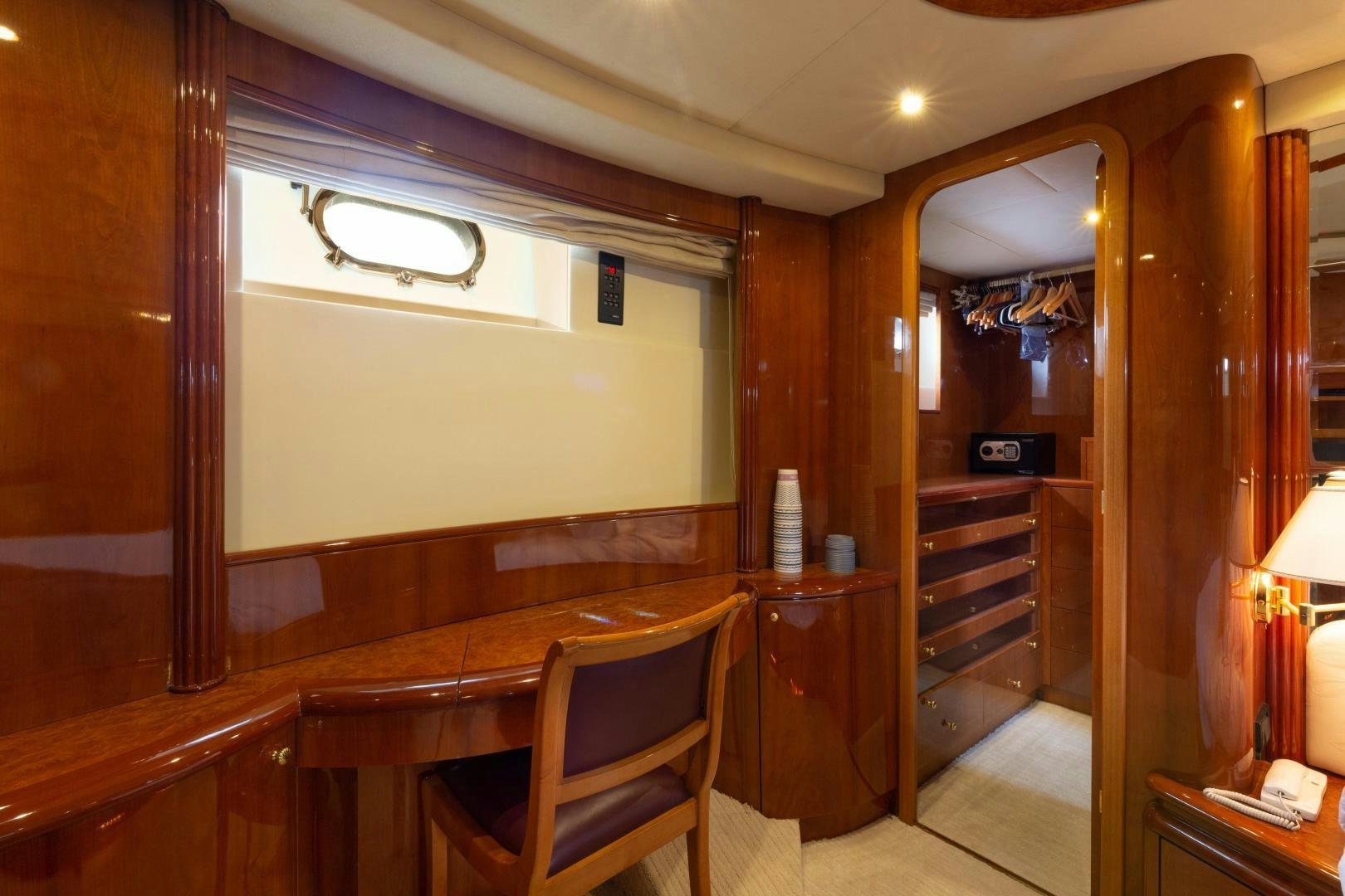 a room with a table and chairs aboard GRAVITY Yacht for Sale