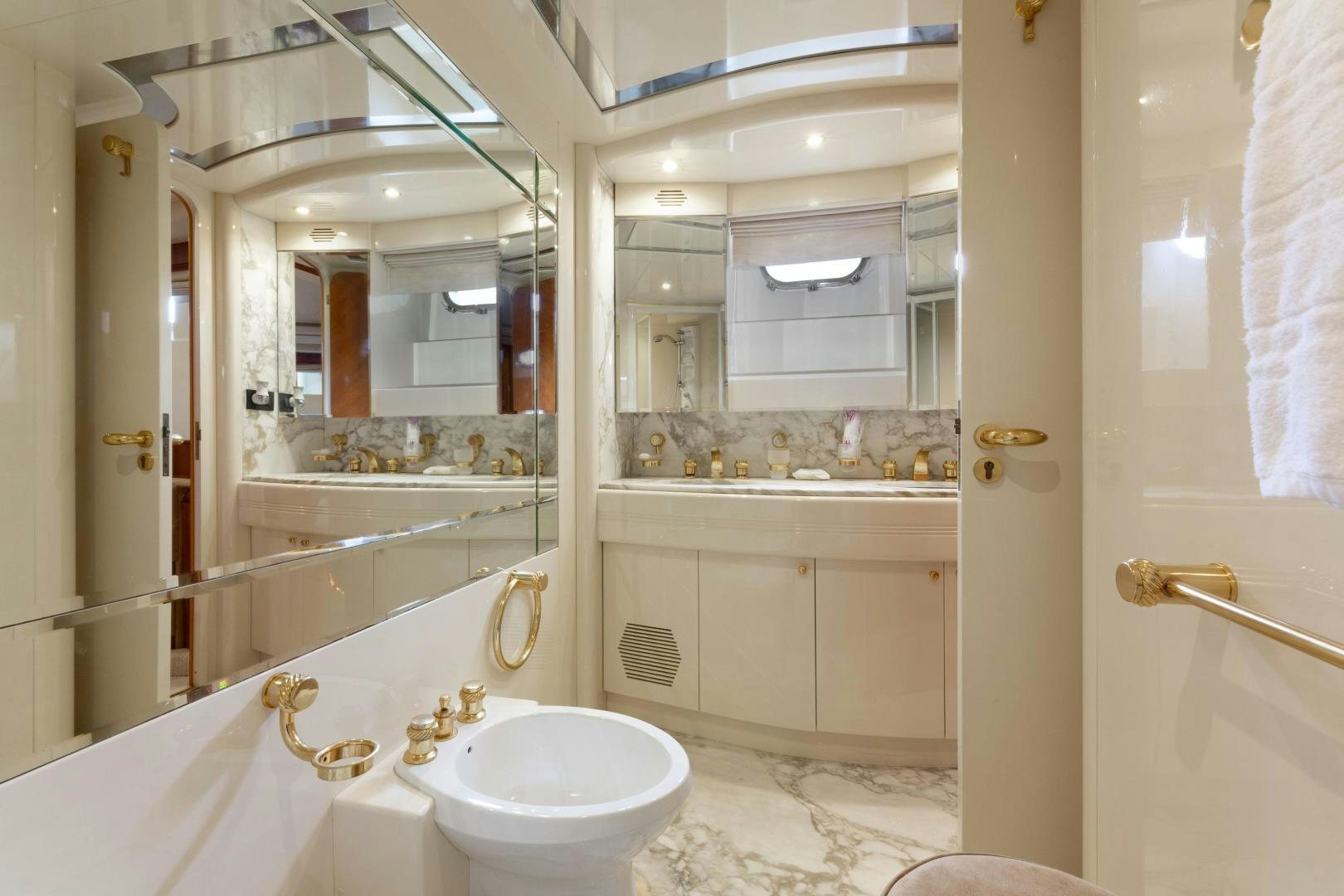 a bathroom with a sink and a mirror aboard GRAVITY Yacht for Sale