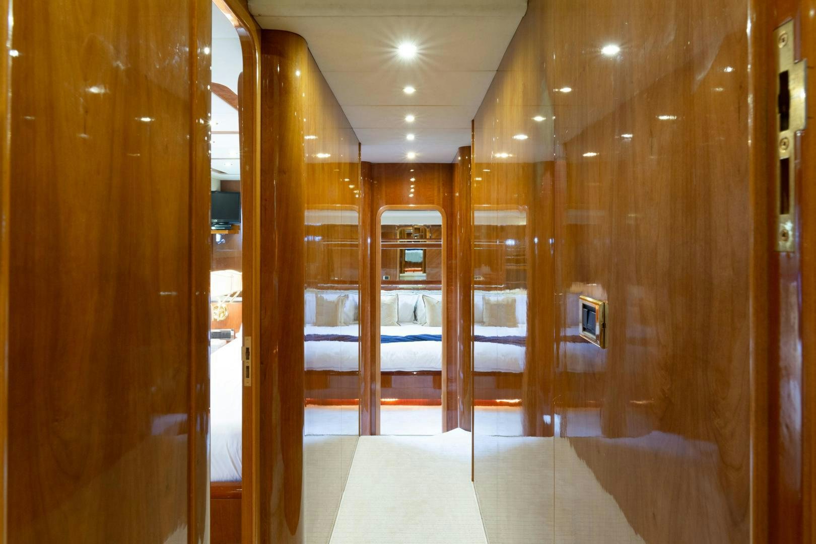 a room with a large mirror aboard GRAVITY Yacht for Sale