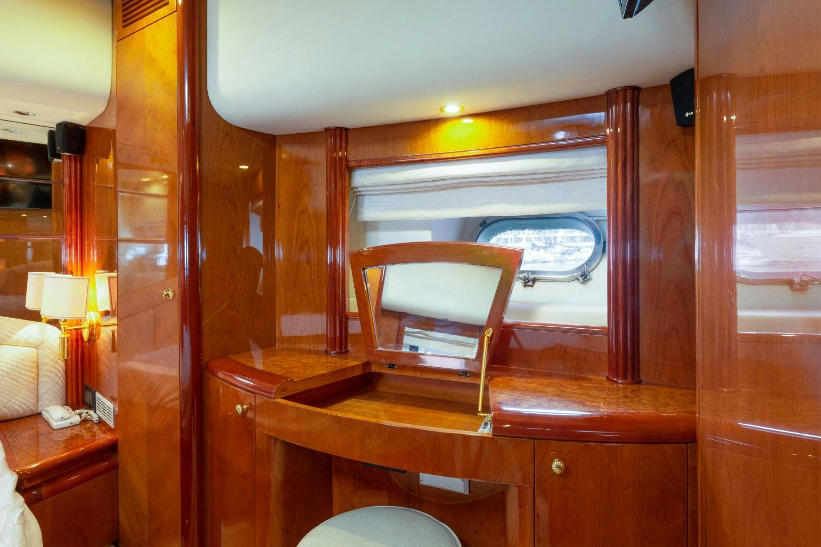 a room with a chair and a window aboard GRAVITY Yacht for Sale