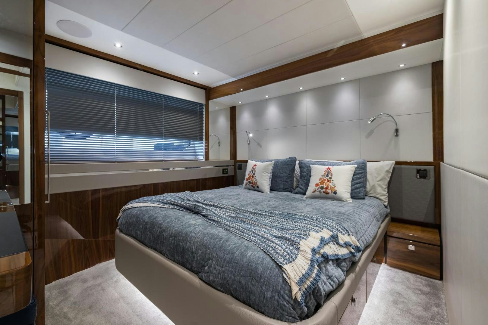 a bed in a room aboard MR. G Yacht for Sale