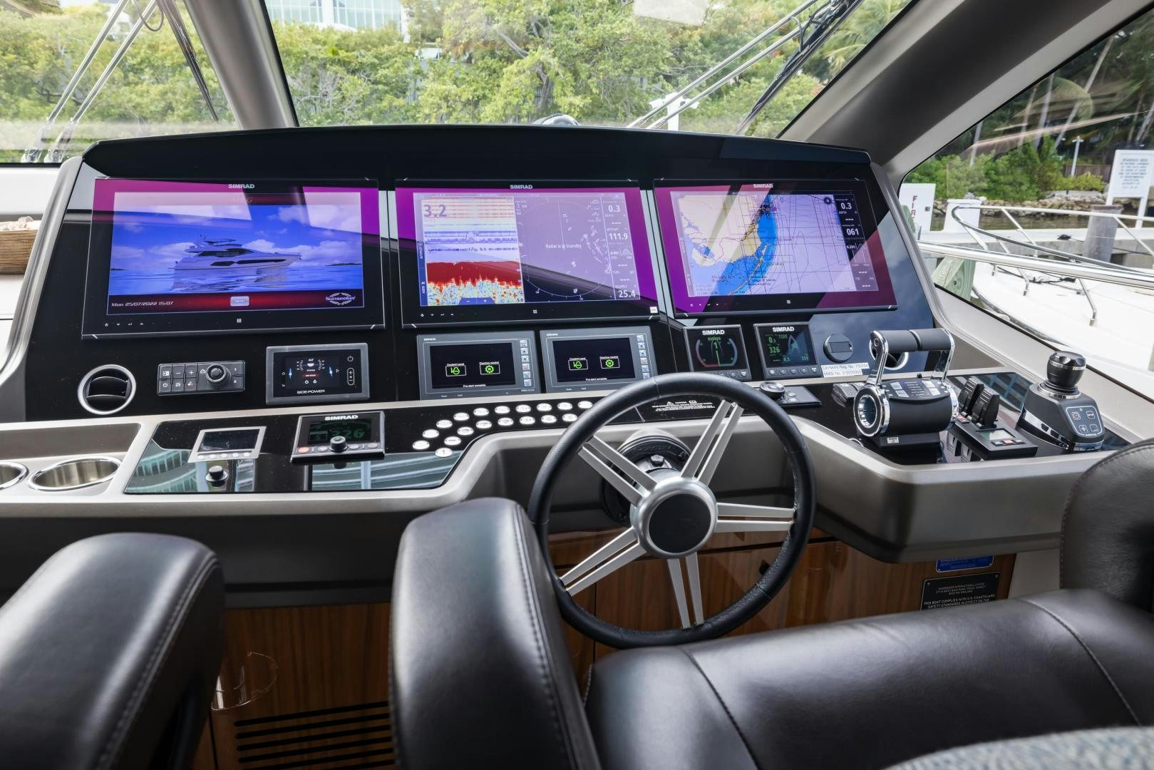 inside of a car aboard MR. G Yacht for Sale