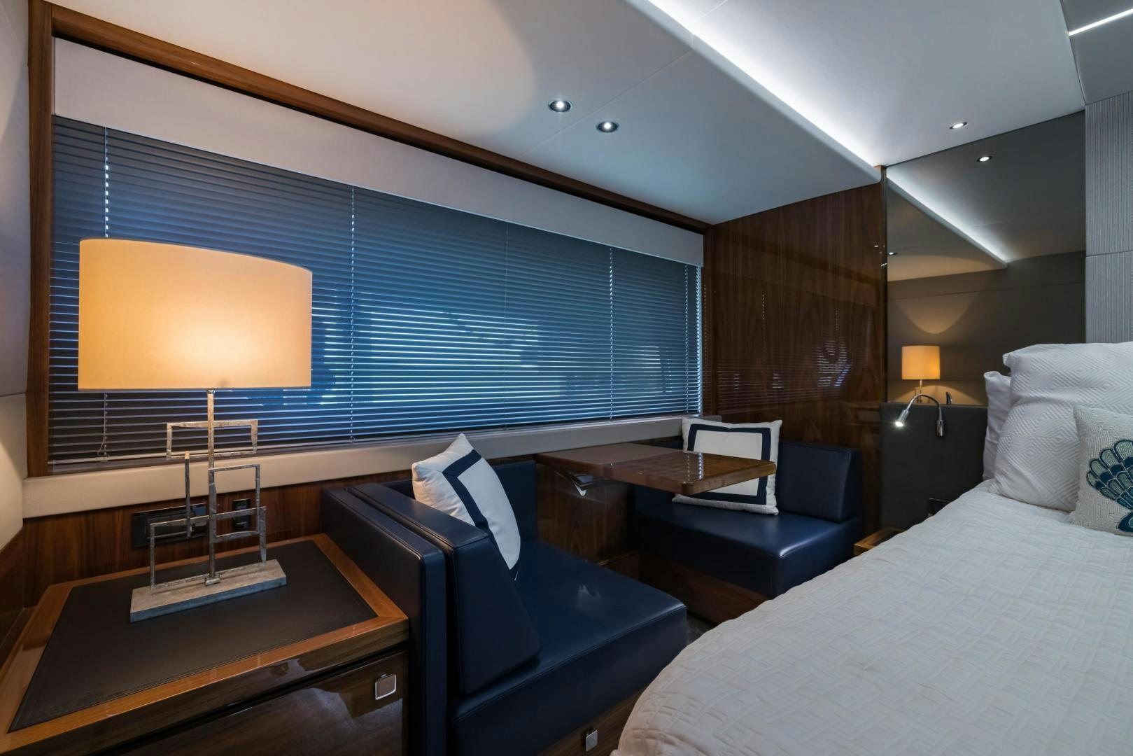 a room with a bed and a tv aboard MR. G Yacht for Sale