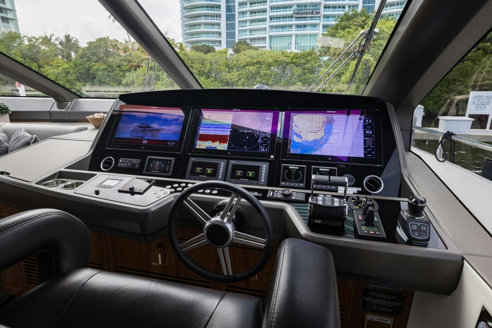 inside of a car aboard MR. G Yacht for Sale