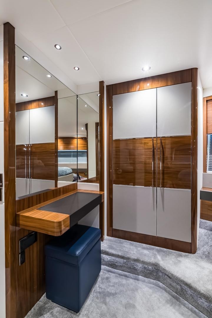 a bathroom with a large glass shower aboard MR. G Yacht for Sale
