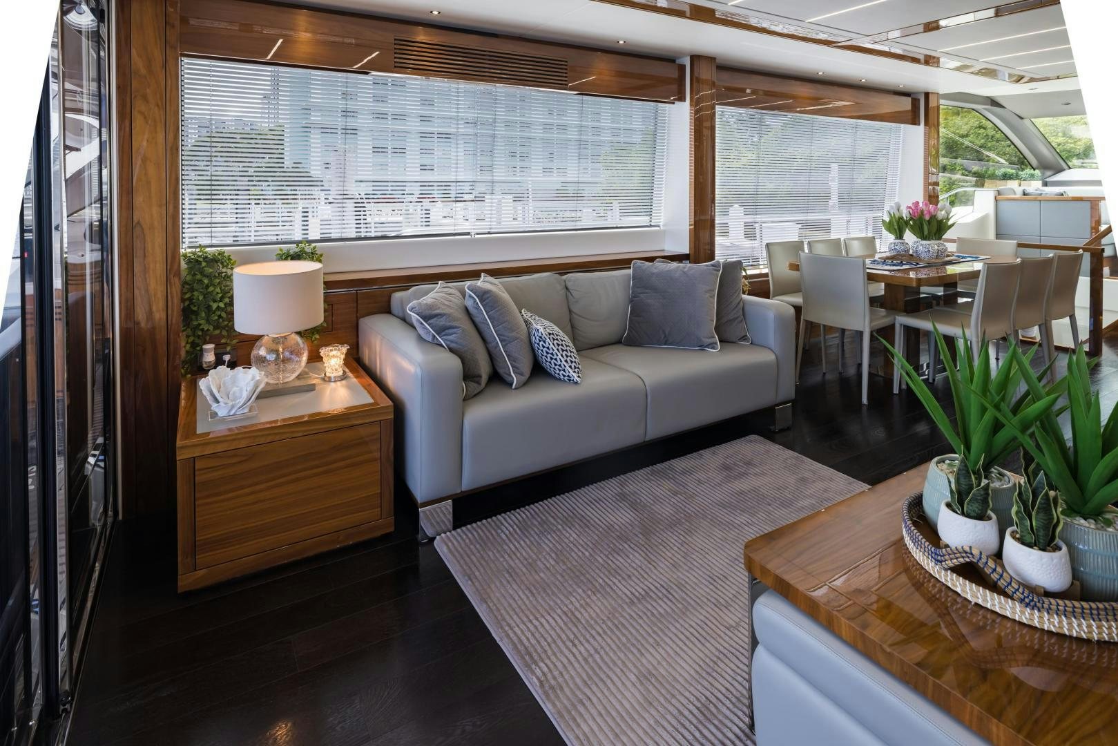 a room with a bed and a table aboard MR. G Yacht for Sale