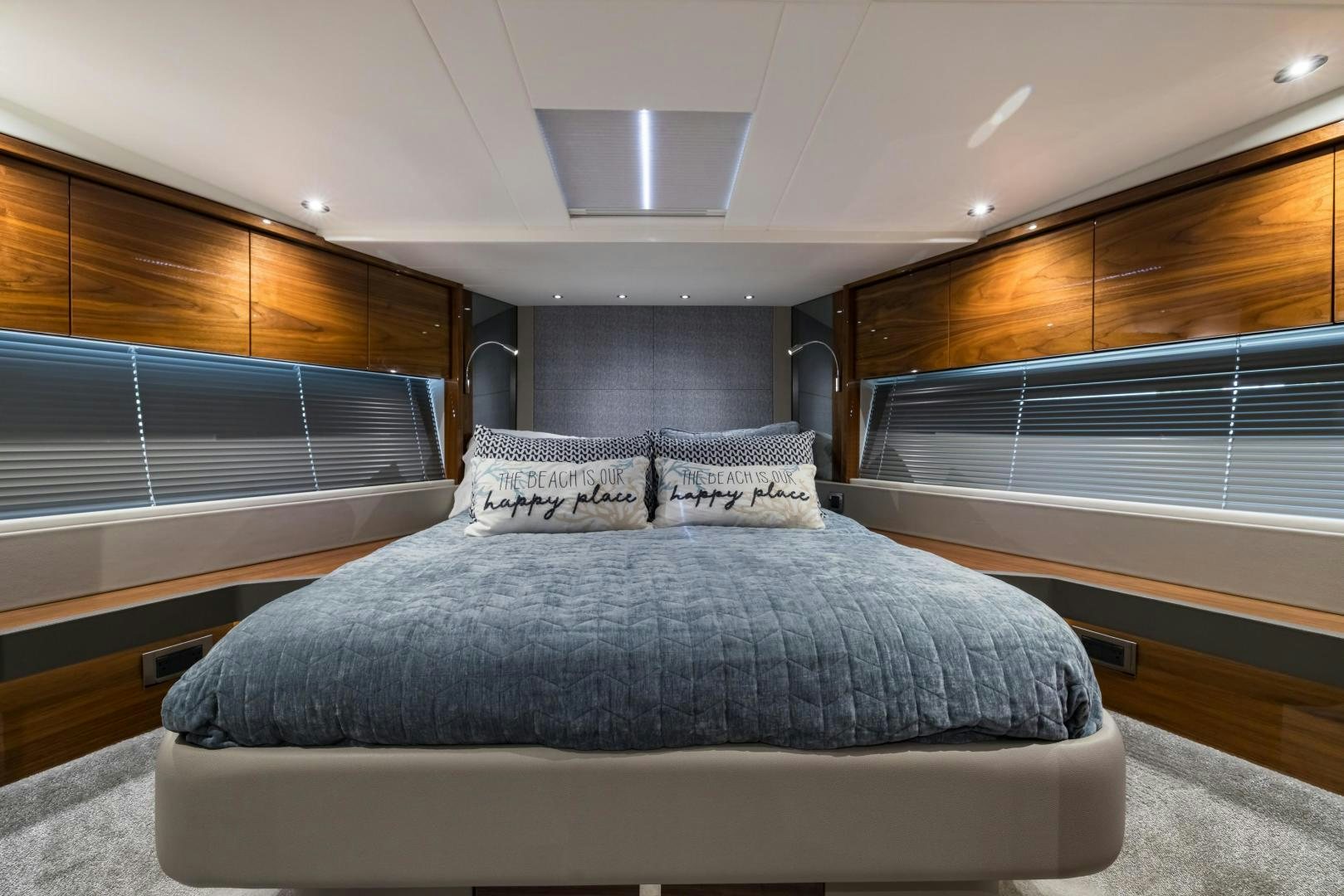 a bed in a room aboard MR. G Yacht for Sale