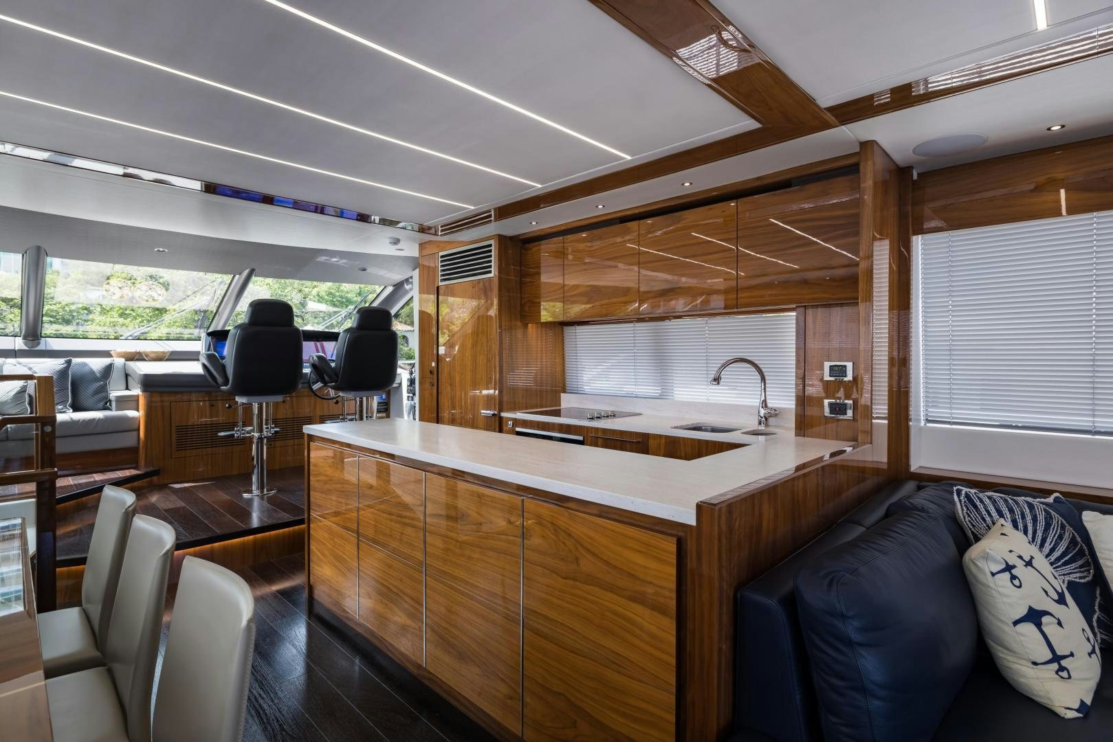 a kitchen with a large island aboard MR. G Yacht for Sale