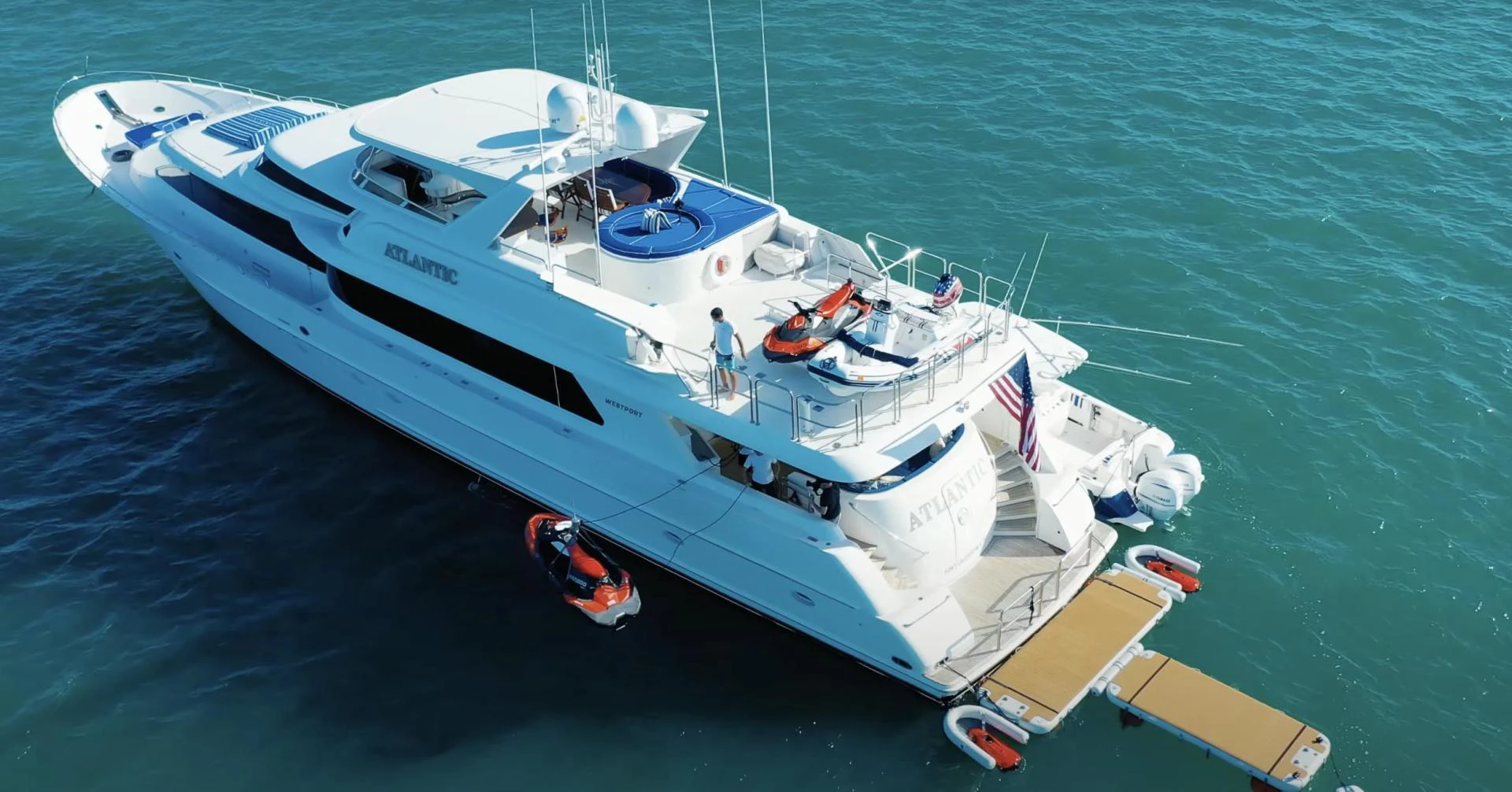 a white boat on the water aboard ATLANTIC Yacht for Sale