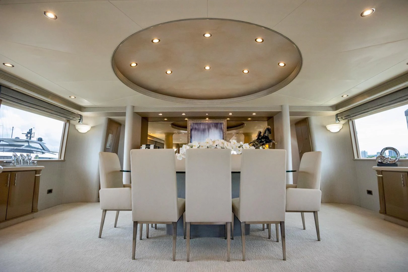 a large room with a table and chairs aboard ATLANTIC Yacht for Sale