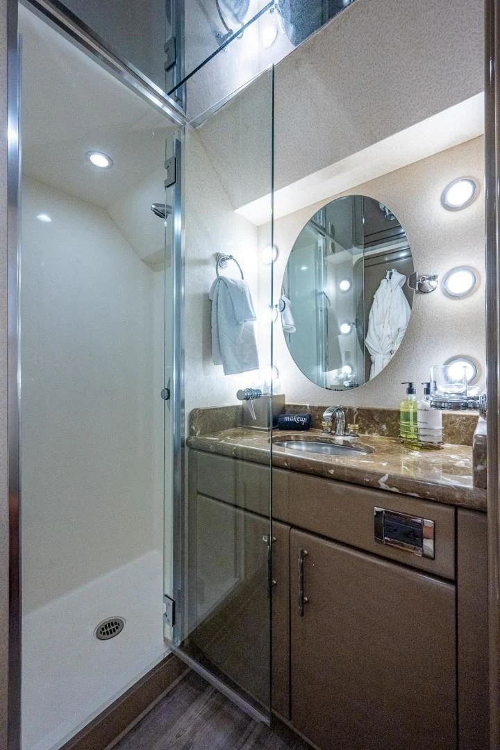 a bathroom with a large mirror aboard ATLANTIC Yacht for Sale