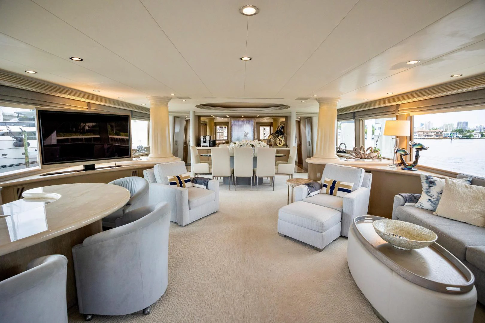 a living room with a large kitchen and dining area aboard ATLANTIC Yacht for Sale