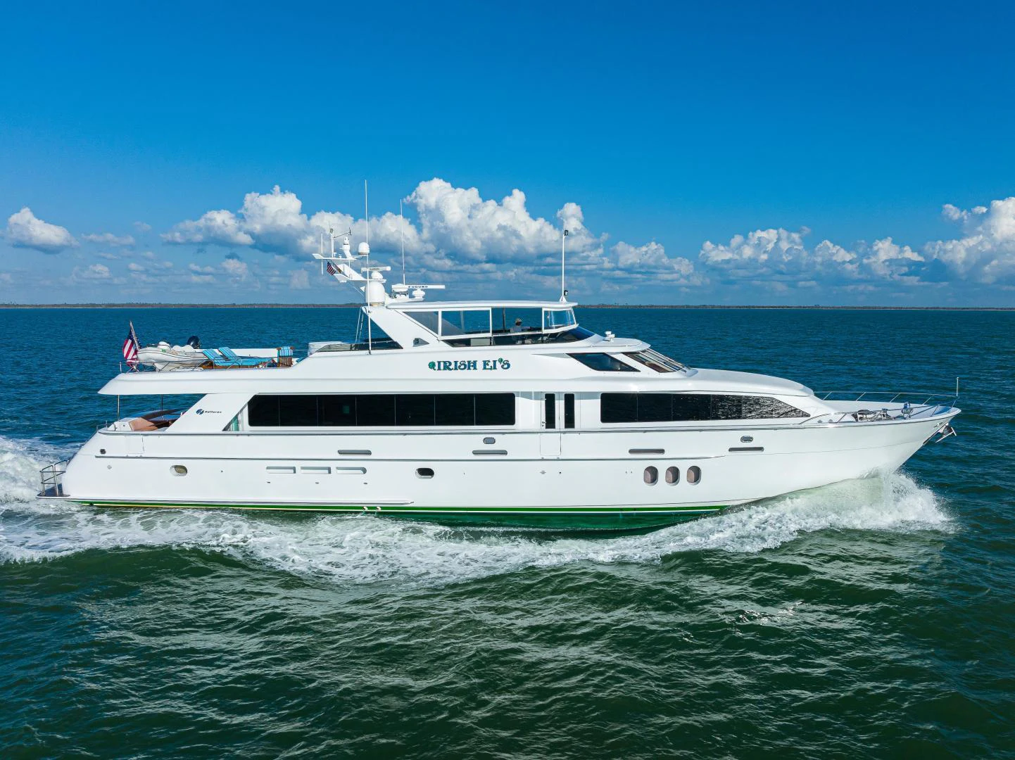 a white yacht in the water aboard IRISH EI'S Yacht for Sale