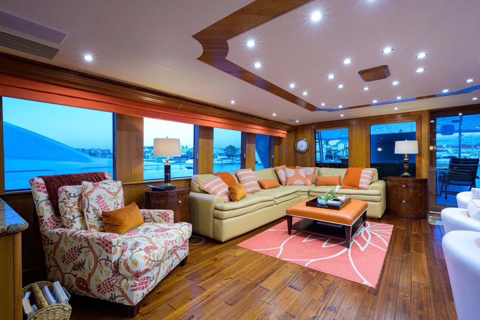 a living room with a large window aboard IRISH EI'S Yacht for Sale