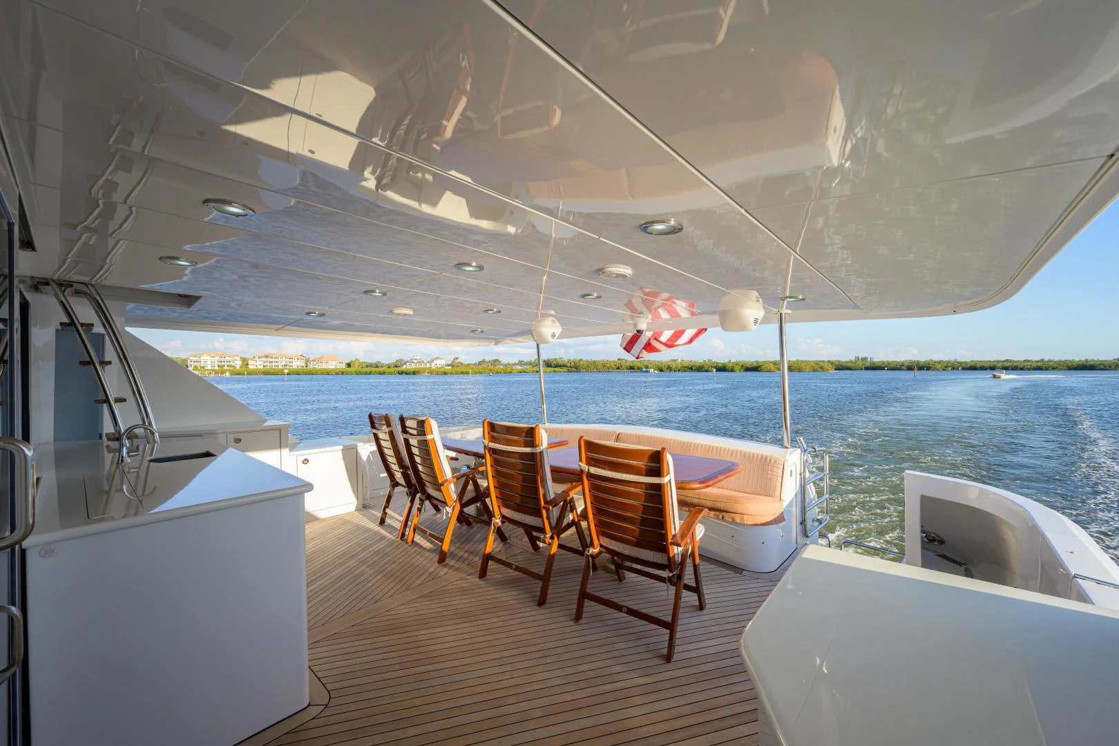 a boat with chairs on a deck aboard IRISH EI'S Yacht for Sale