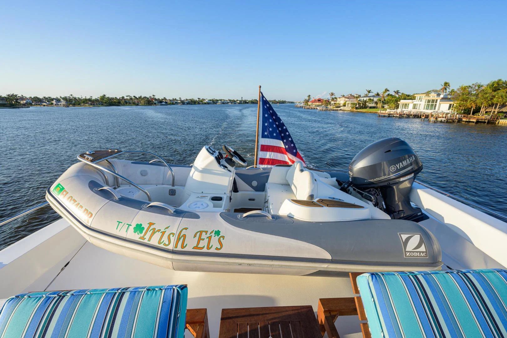 a boat with a flag on the front aboard IRISH EI'S Yacht for Sale