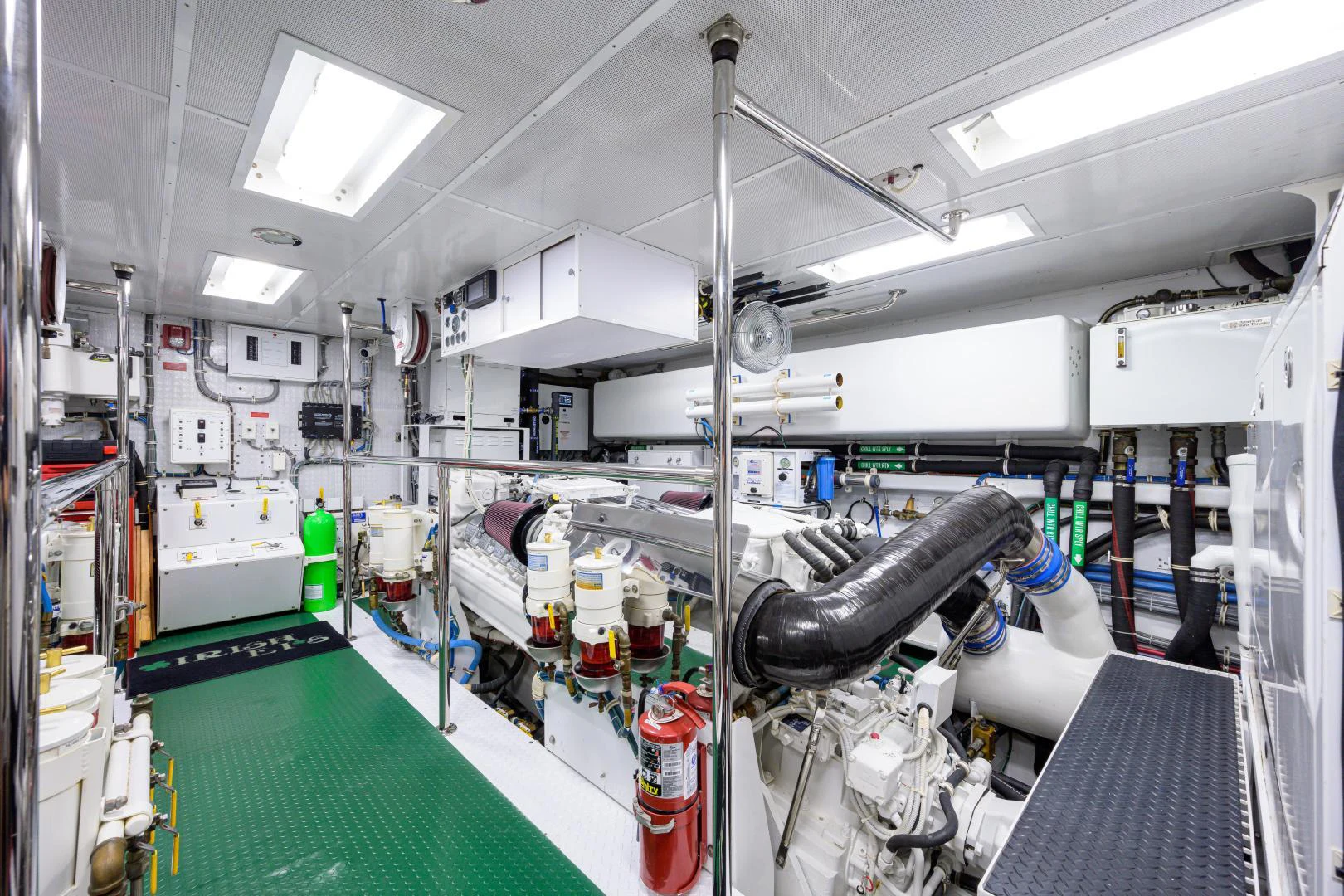 a room with machinery and pipes aboard IRISH EI'S Yacht for Sale