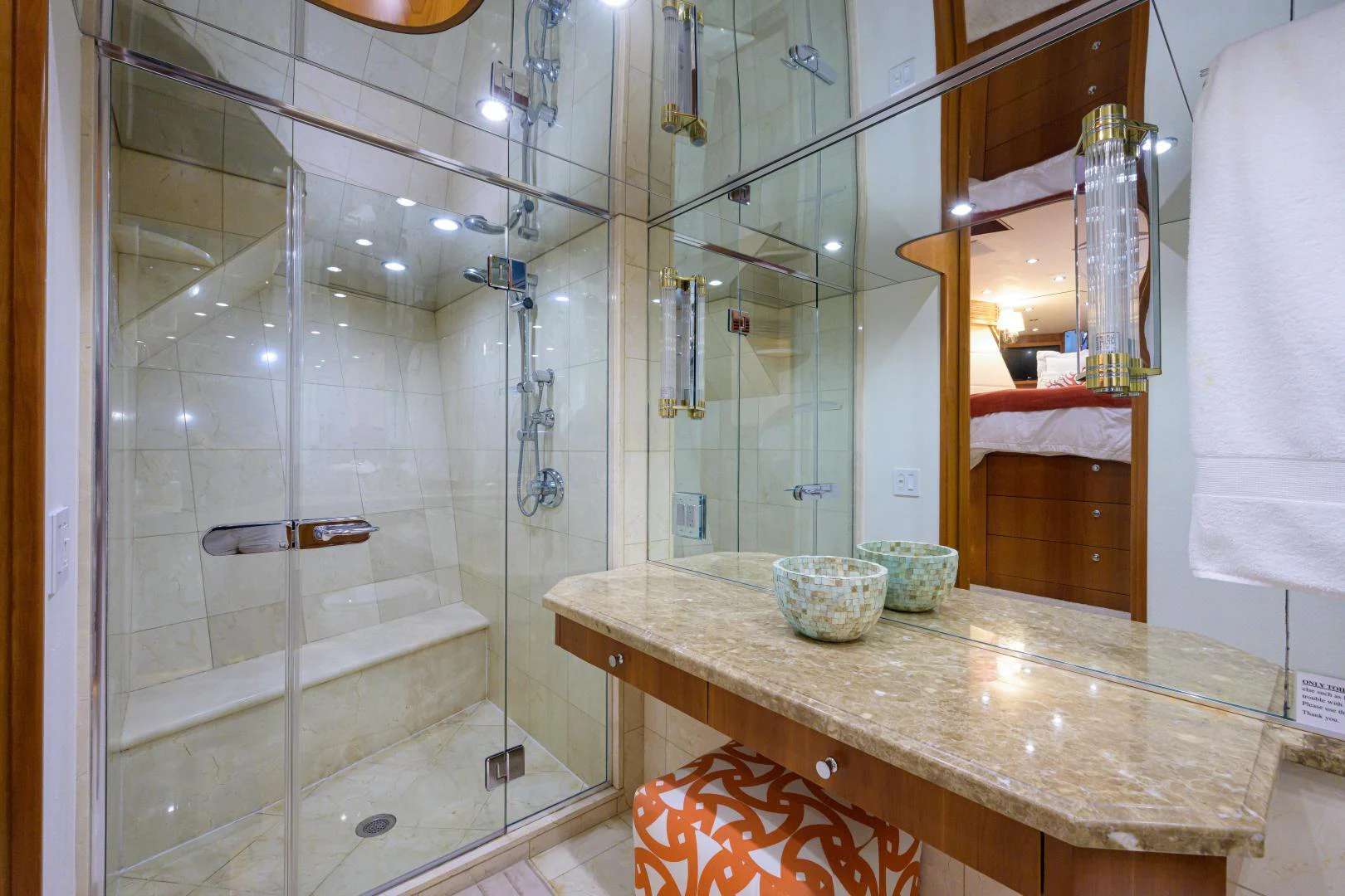 a bathroom with a glass shower aboard IRISH EI'S Yacht for Sale