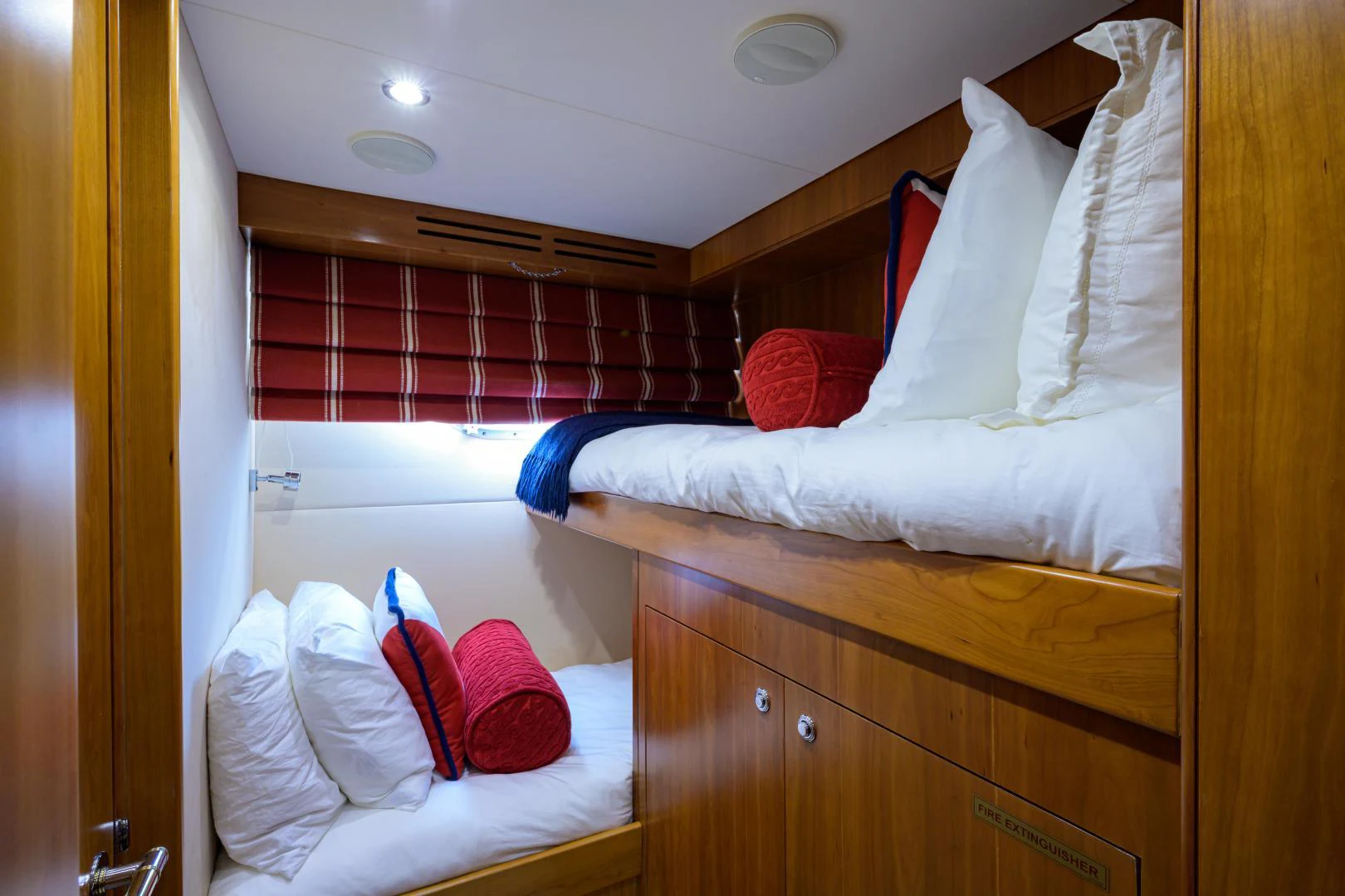a room with a bed and a window aboard IRISH EI'S Yacht for Sale