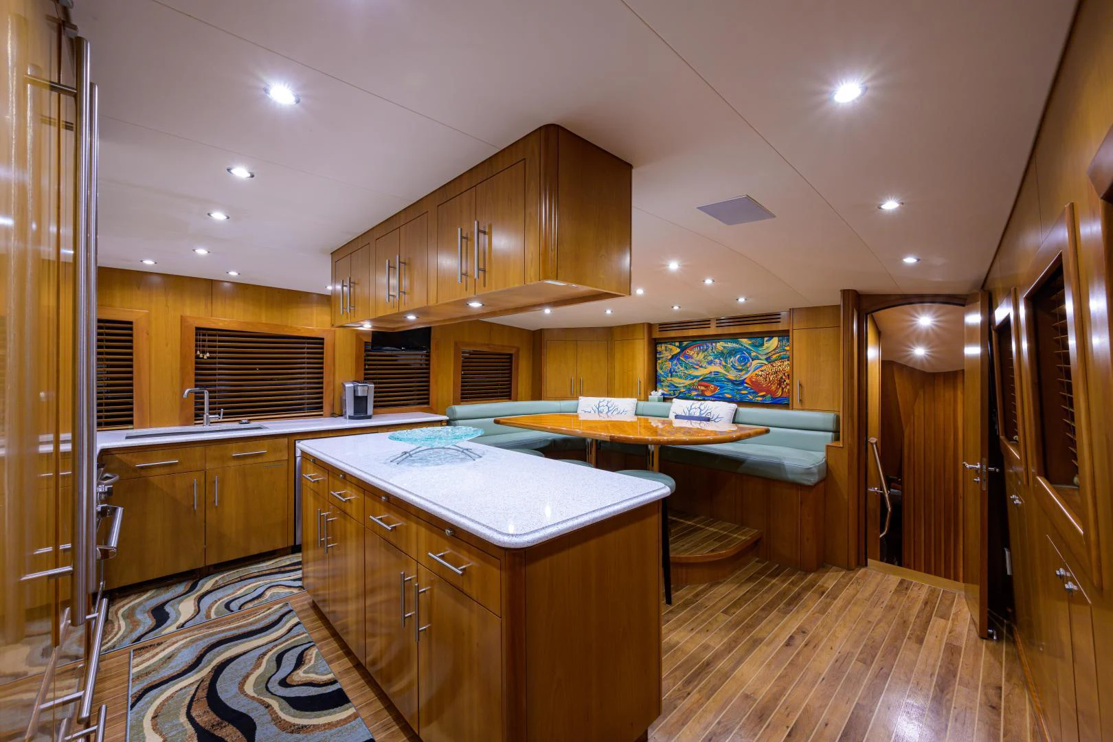 a kitchen with a bar and a pool table aboard IRISH EI'S Yacht for Sale