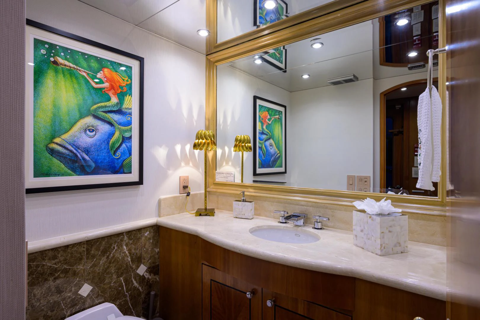 a bathroom with a large mirror aboard IRISH EI'S Yacht for Sale