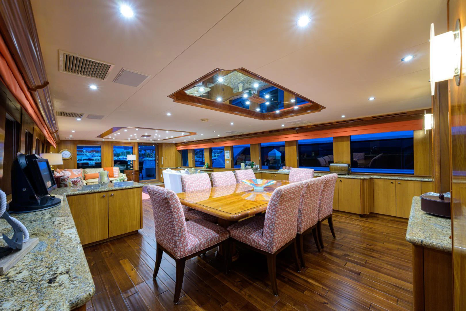 a dining room with a table and chairs aboard IRISH EI'S Yacht for Sale