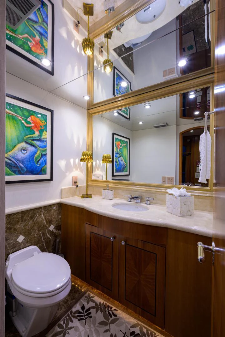 a bathroom with a large mirror aboard IRISH EI'S Yacht for Sale