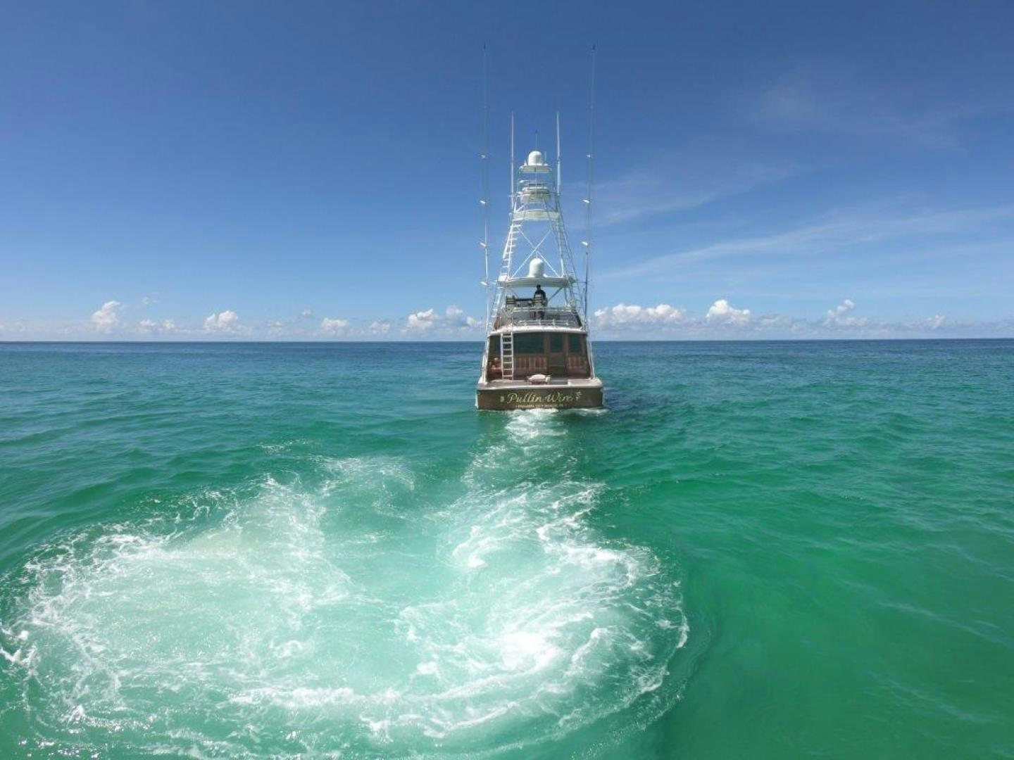 a boat in the ocean aboard PULLIN WIRE Yacht for Sale