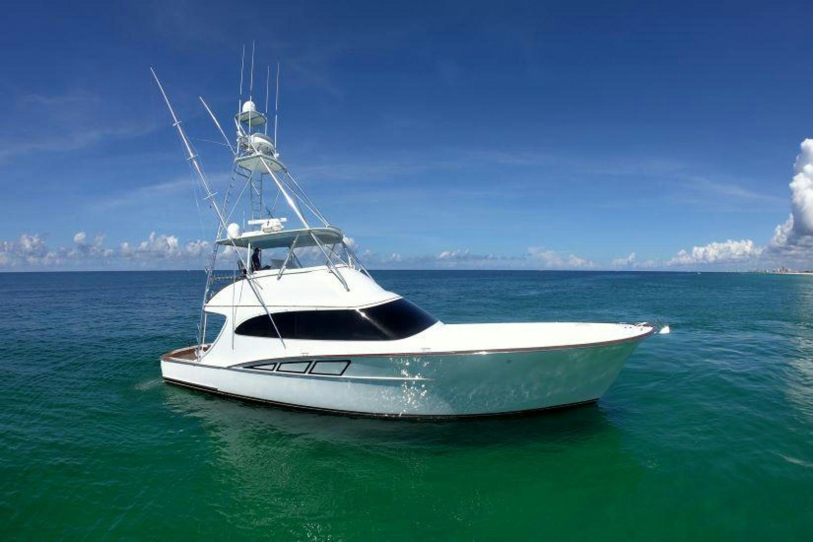 a white boat in the water aboard PULLIN WIRE Yacht for Sale