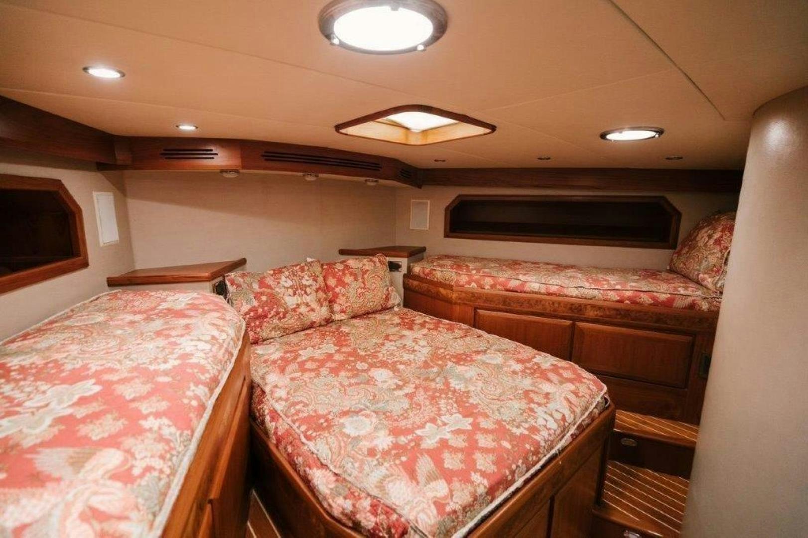 a couple of beds in a room aboard PULLIN WIRE Yacht for Sale