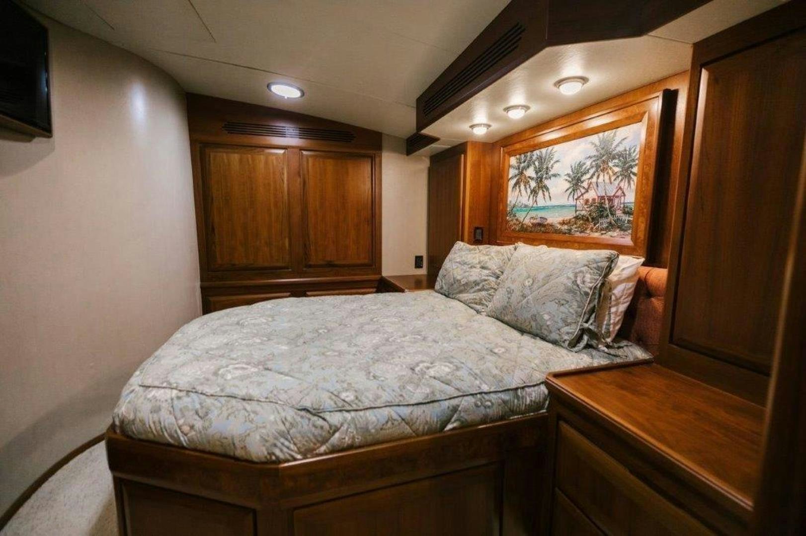 a bed in a room aboard PULLIN WIRE Yacht for Sale