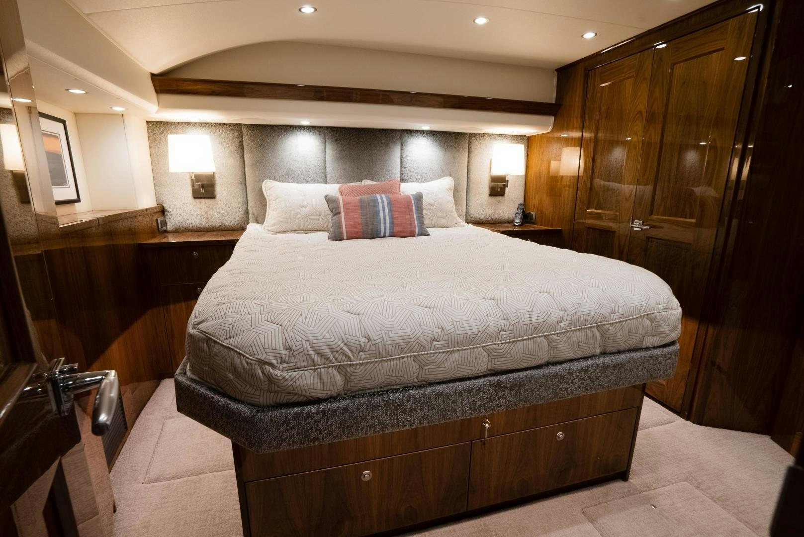 a bed with white sheets aboard DAWG DAZE Yacht for Sale