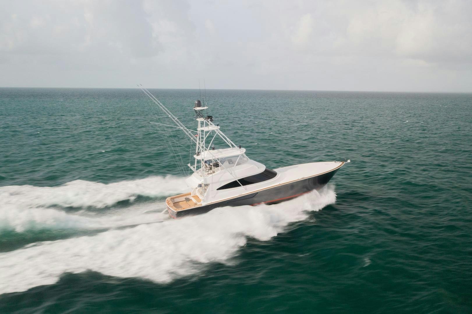 a boat on the water aboard DAWG DAZE Yacht for Sale